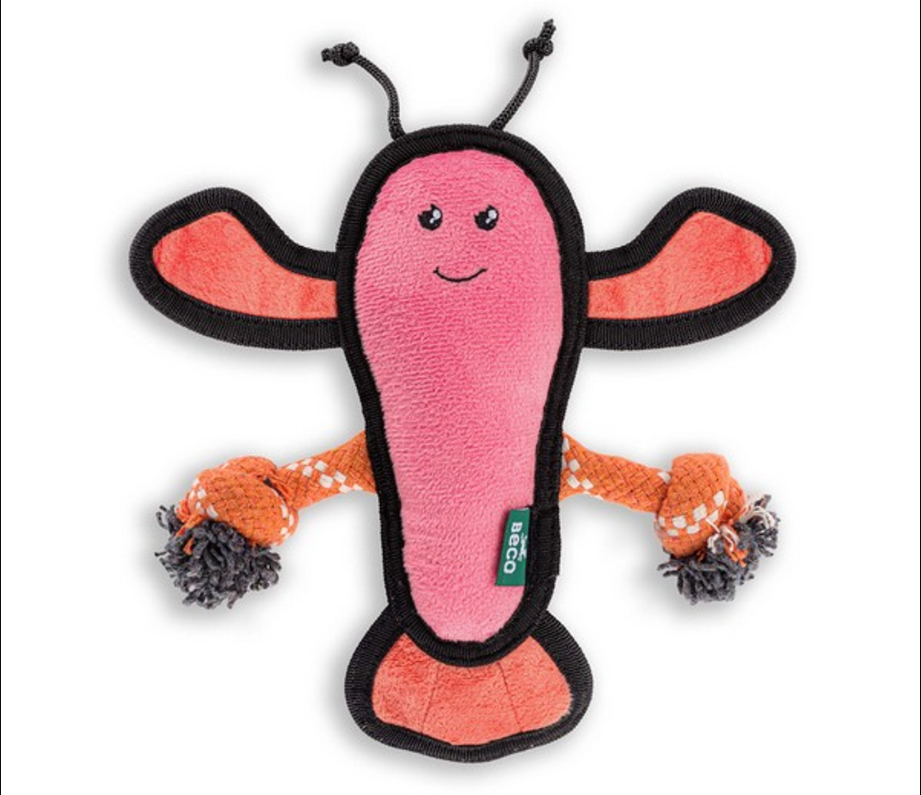Pink/ coral coloured lobster plush dog toy, with embroidered face, black border and small rope knots coming out of the side 