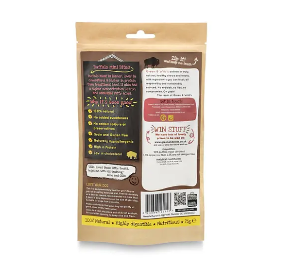 A bag of Greens & Wilds Buffalo Mini Bites dog treats with a small pile of the brown treats displayed in front on a white background. Image shows the back of the packaging 