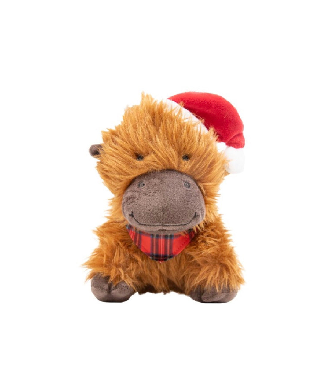 A plush Scottish highland cow toy with shaggy brown fur, wearing a red and white Santa hat and a red tartan plaid scarf, set against a plain white background.