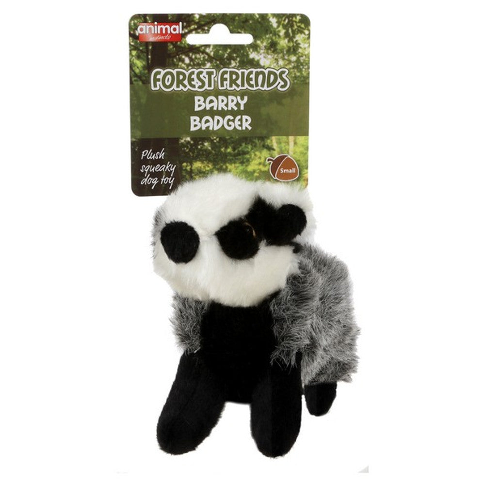 A plush dog toy in the shape of a badger (black, white and grey)