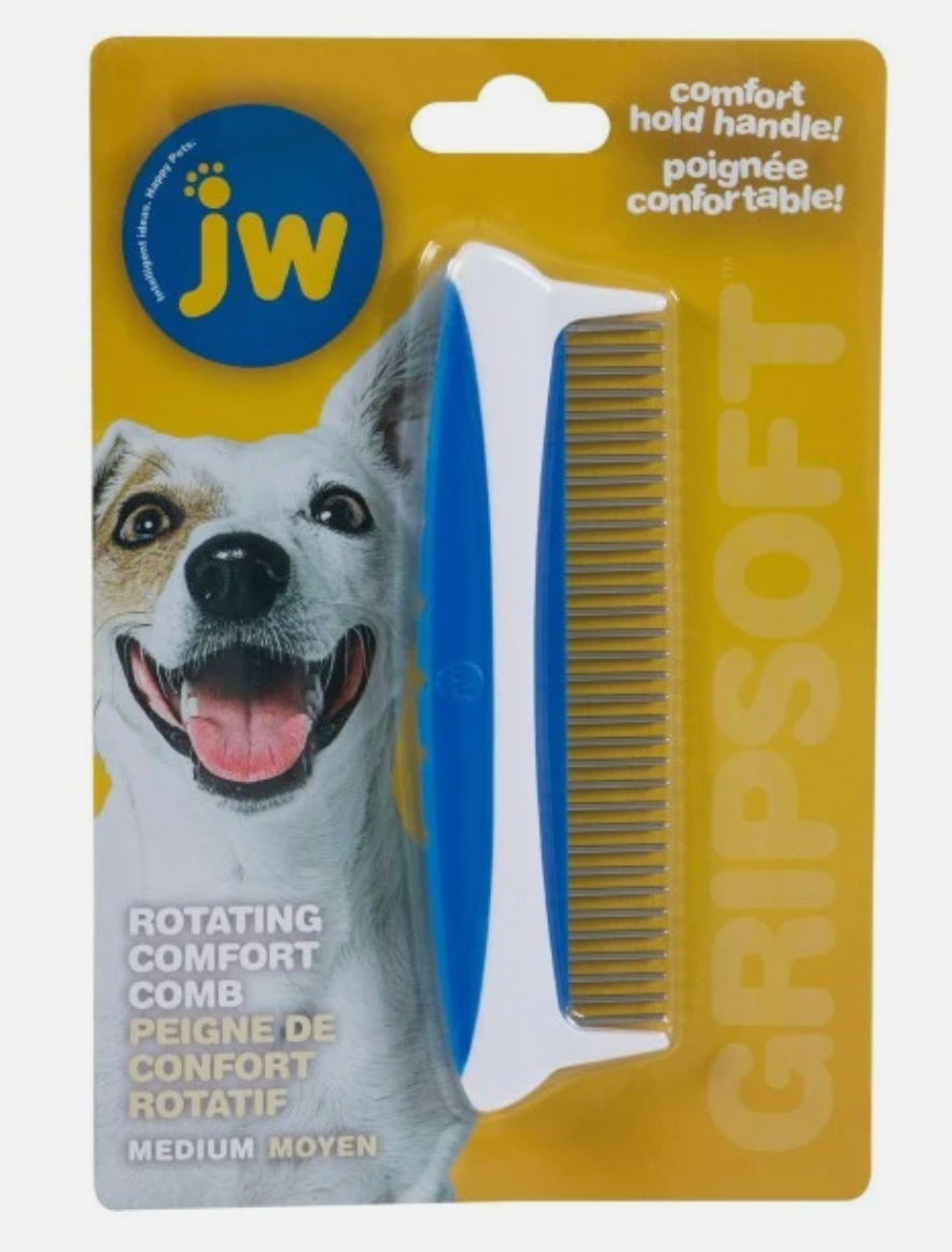 Image shows a white a blue fine tooth dog grooming comb. In a yellow and blue packaging with a white dog on the front. 