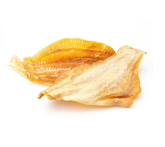 Two dried plaice fillets on a white background