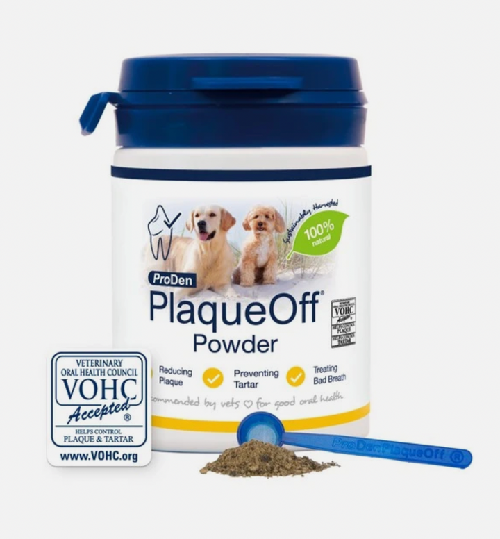 Packaging of ProDen Plaque off powder with an image of two dogs on the front. Blue lid with white bottle 