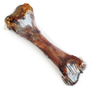 Individual pork leg bone dog treat in a clear plastic packaging.