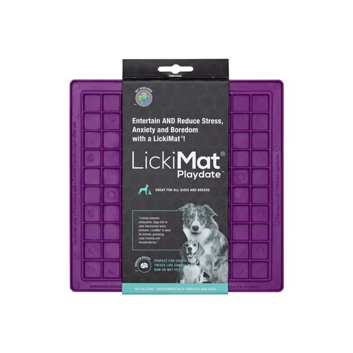 A purple, square mat, slow feeder mat for dogs, with raised squares for food placement. 
