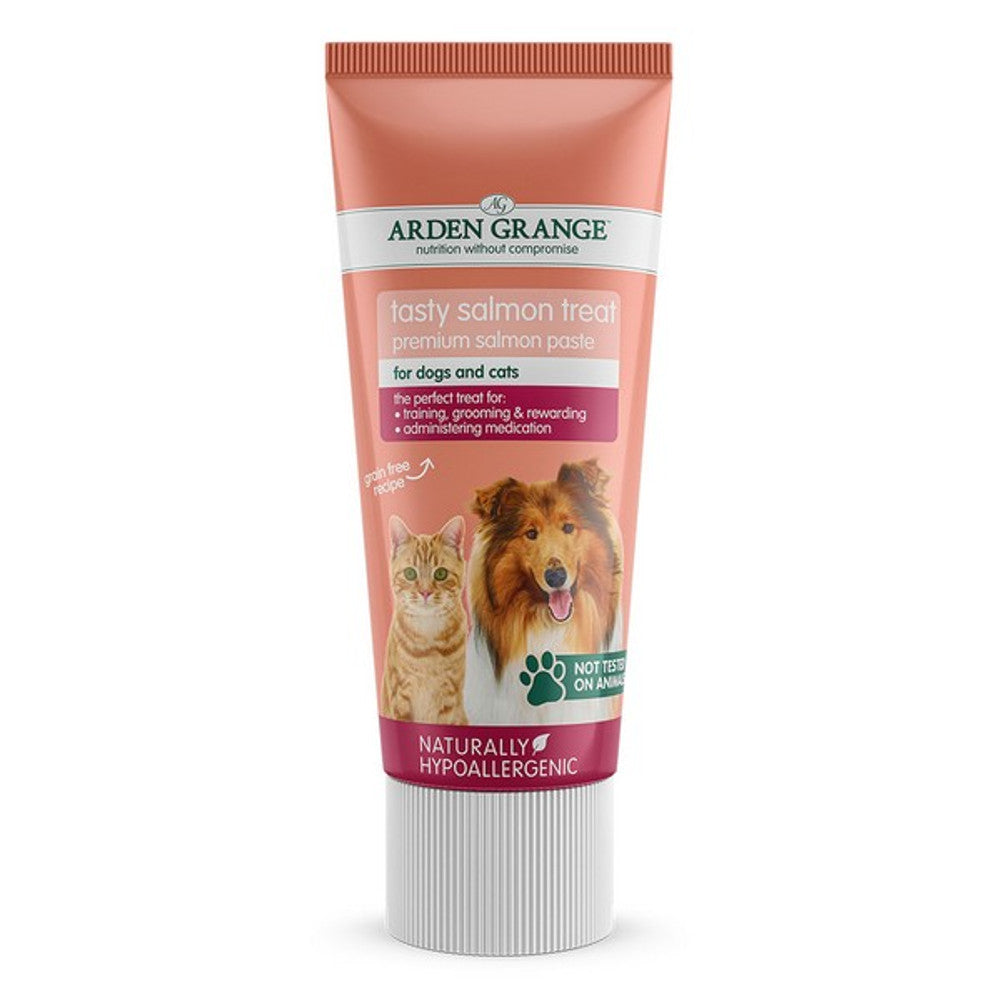 A tube packaging of Arden Grange tasty salmon treat premium pouch paste, indicating suitability for dogs and cats, and highlighting its hypoallergenicity.