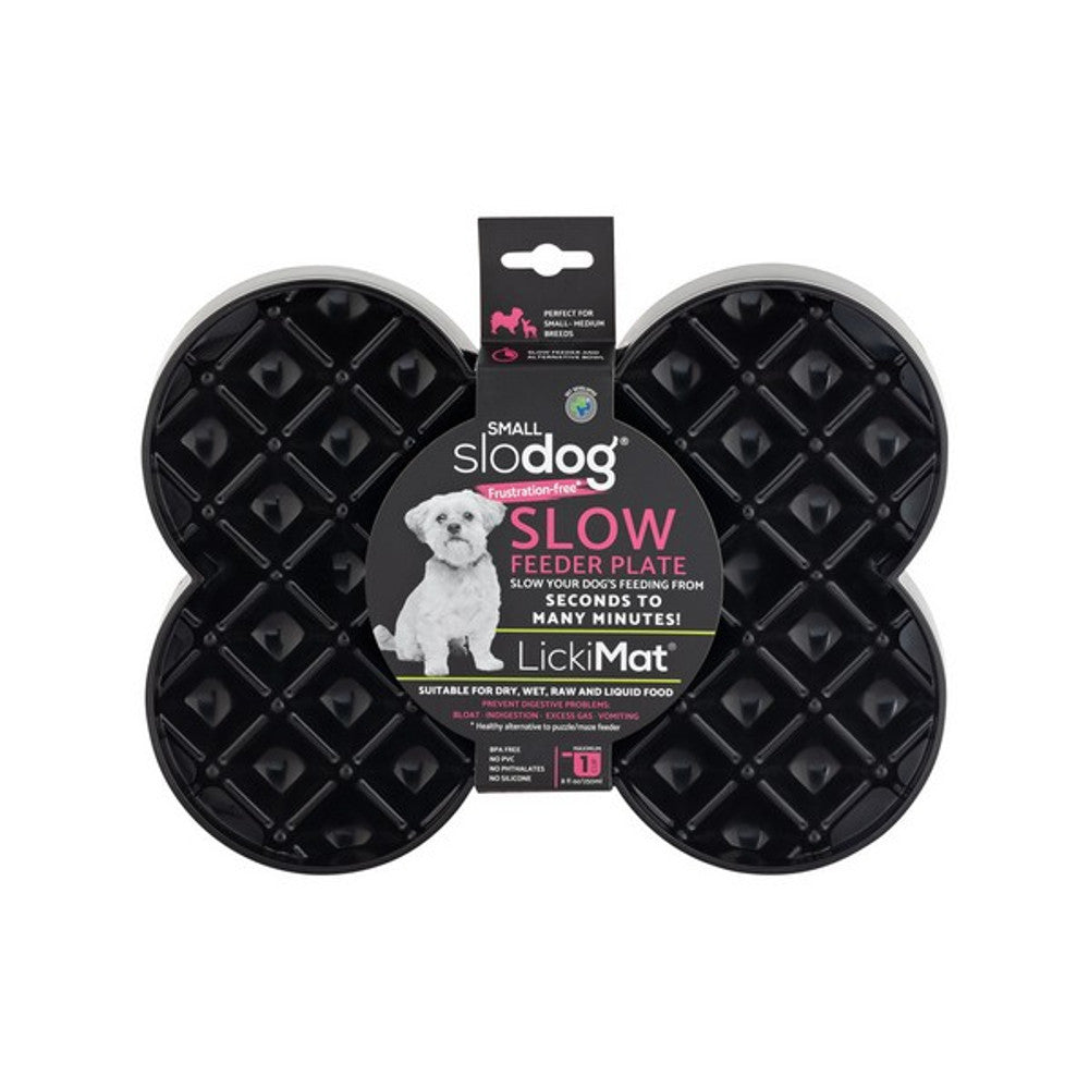A black bone shaped Lickimat slow feeder mat for dogs, featuring raised dots for food placement