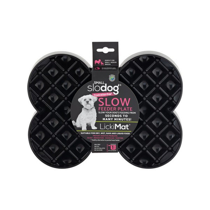 A black bone shaped Lickimat slow feeder mat for dogs, featuring raised dots for food placement
