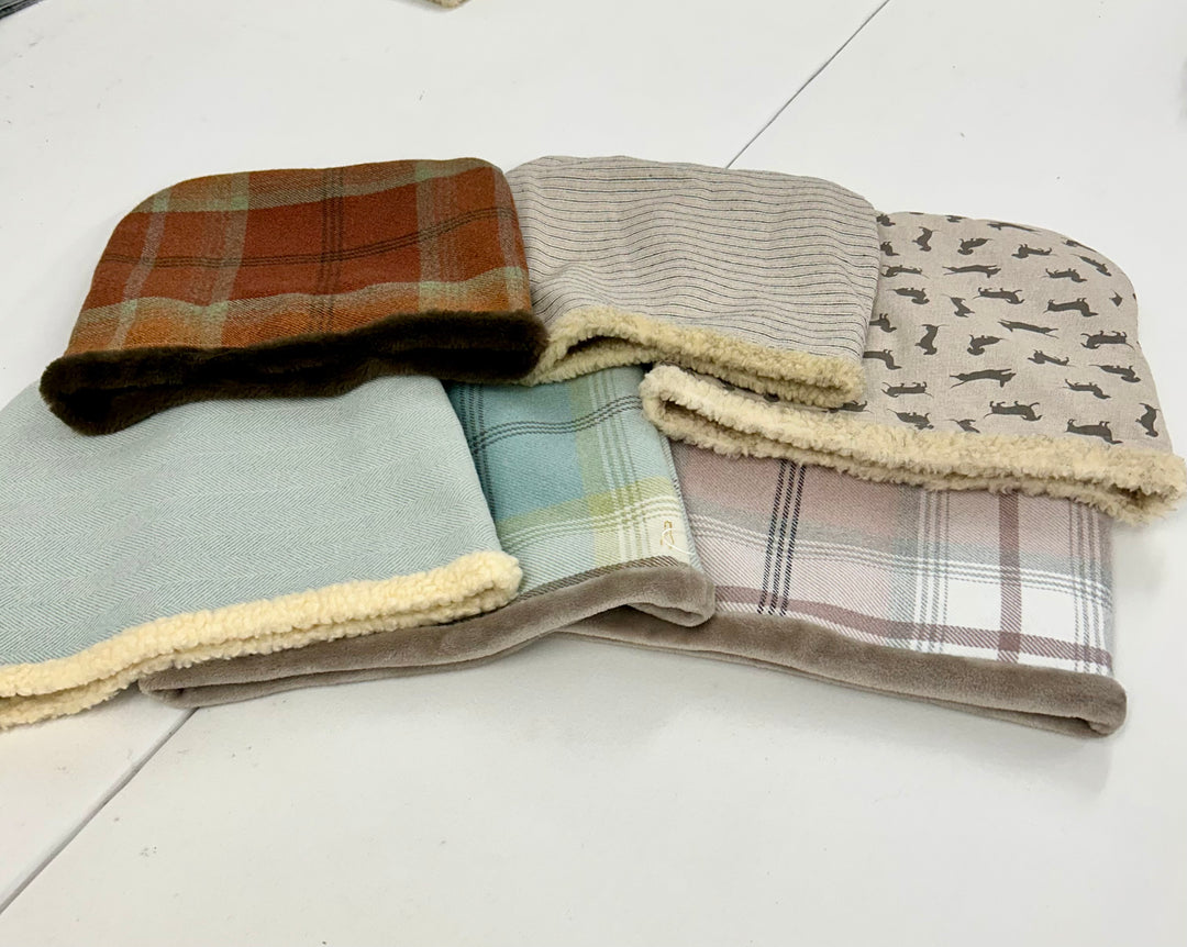 Collection of teacup puppy snuggle sacks, in various fabrics 