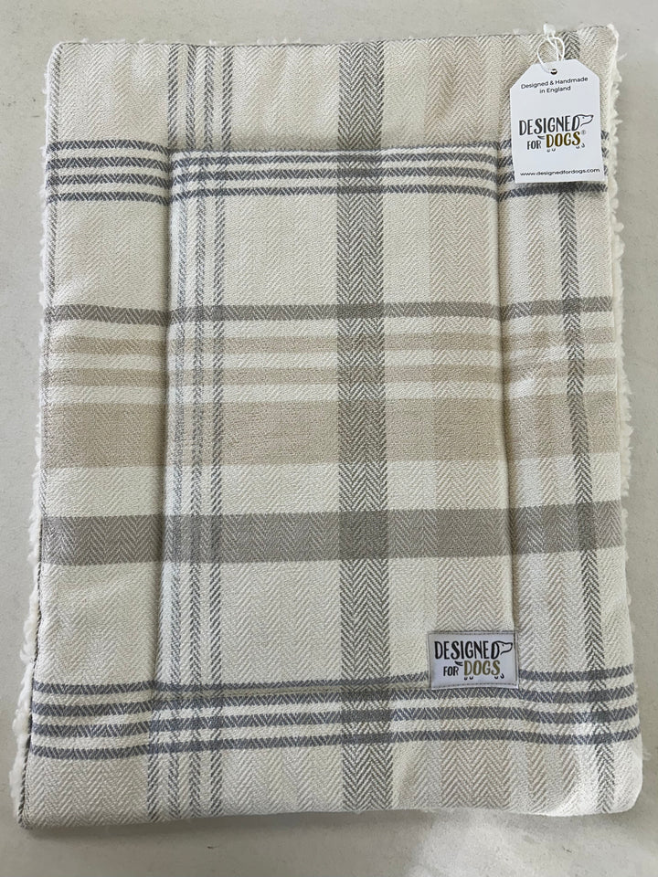 Extra small grey/ beige tartan dog mat with a designed for dogs label 