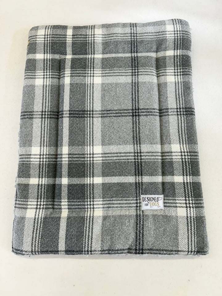 Extra small grey/ beige tartan dog mat with a designed for dogs label 