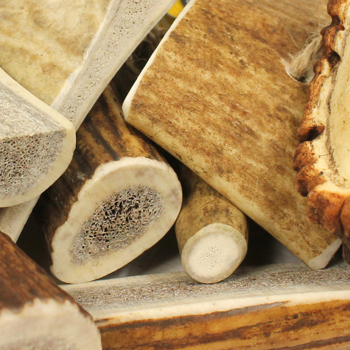 Close up image of multiple Green & Wild's antler chews